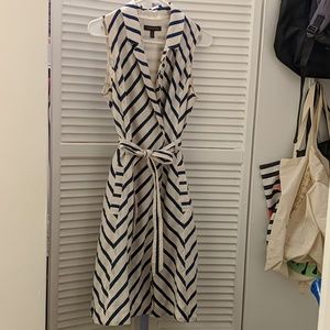 Navy and white sleeveless wrap white dress